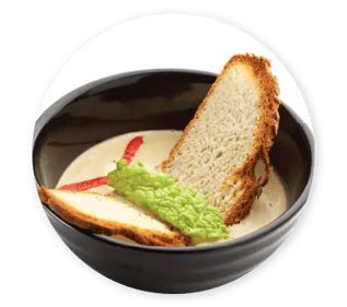 a-slice-of-bread-in-a-bowl-of-soup