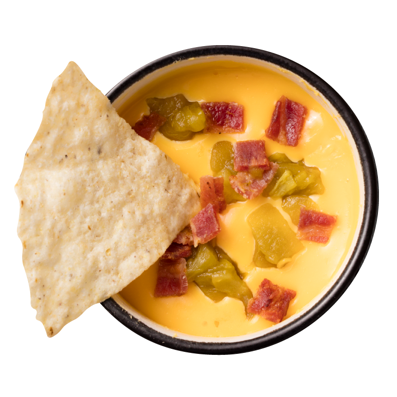 tortilla-chip-on-bowl-of-creamy-queso-1